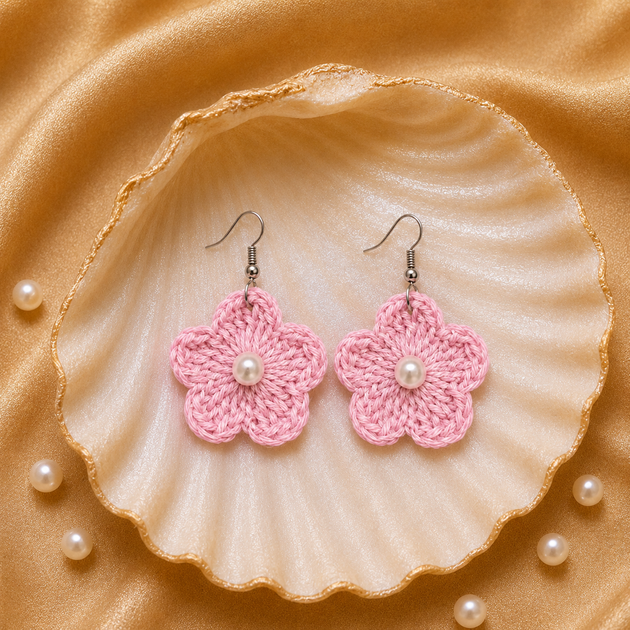 Baby Pink flower-shaped earrings with pearls on a shell and pearl background artisian touch