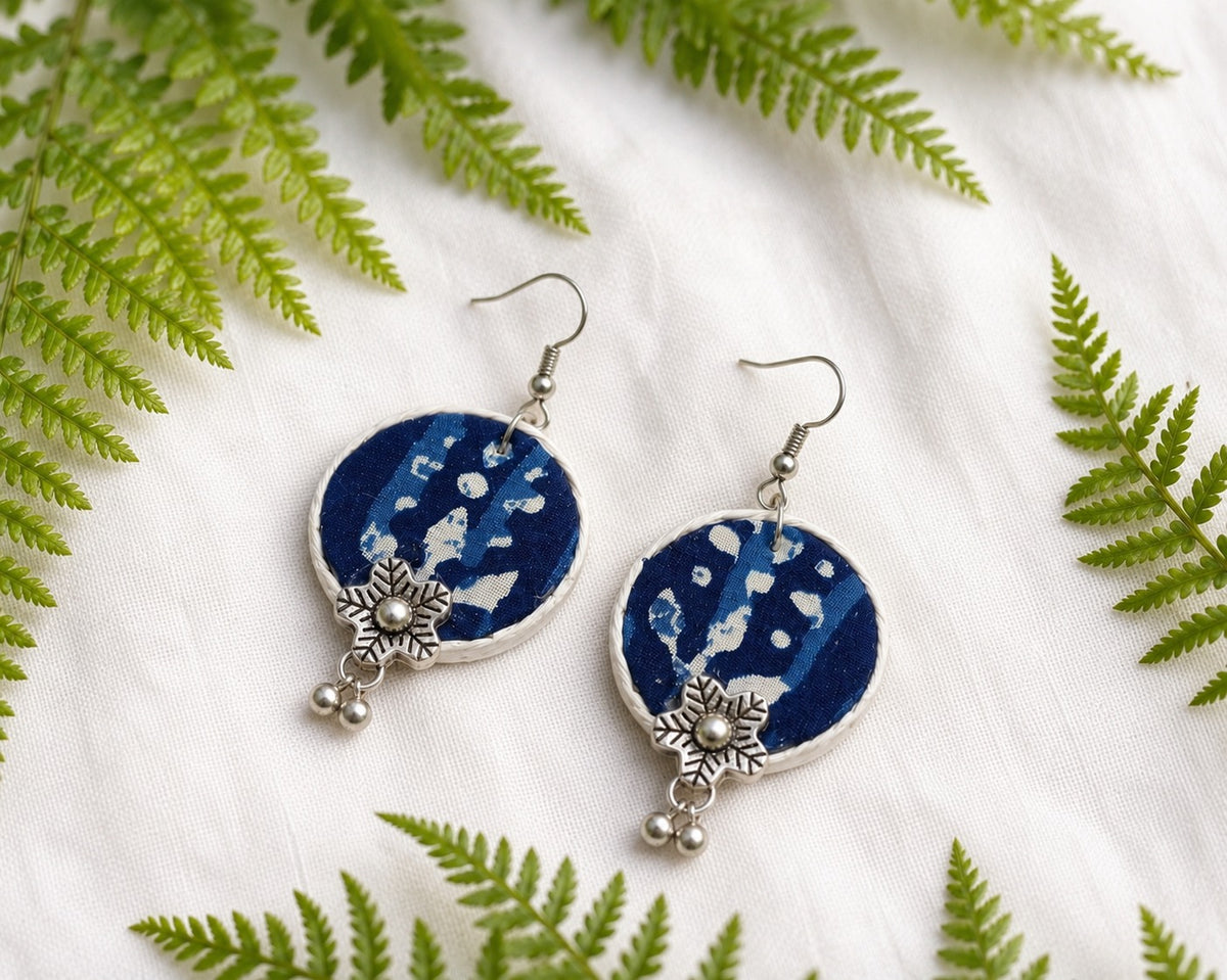 Handmade round Indigo fabric earrings with silver floral charm and ghungroos by Artisian Touch