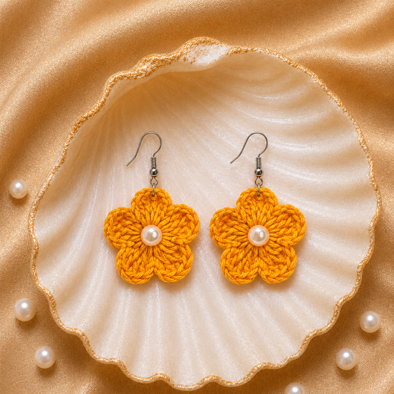Mustard Yellow flower-shaped earrings with pearls on a shell and pearl background artisian touch