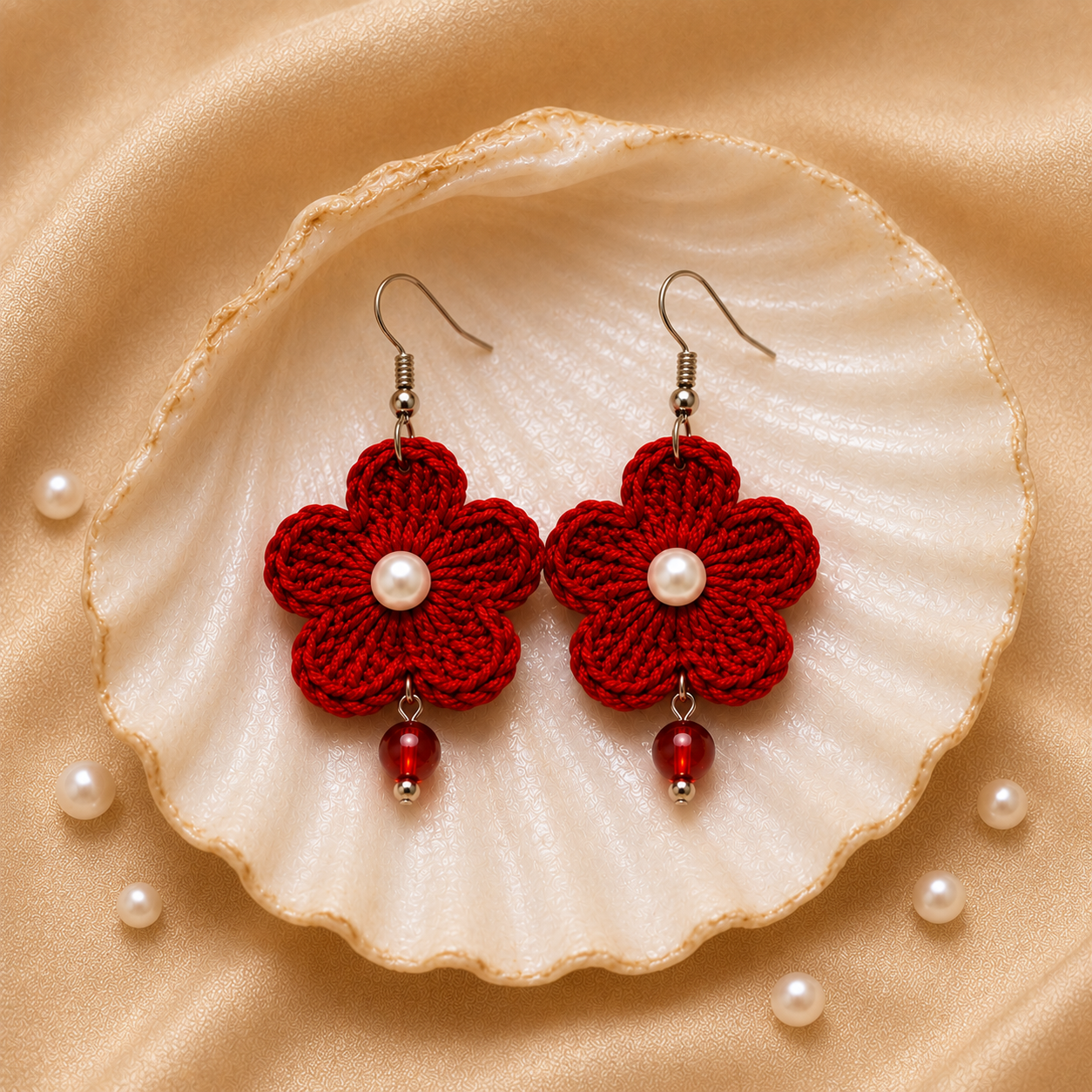 Red handmade crochet flower earrings with pearl and red bead accents by Artisian Touch